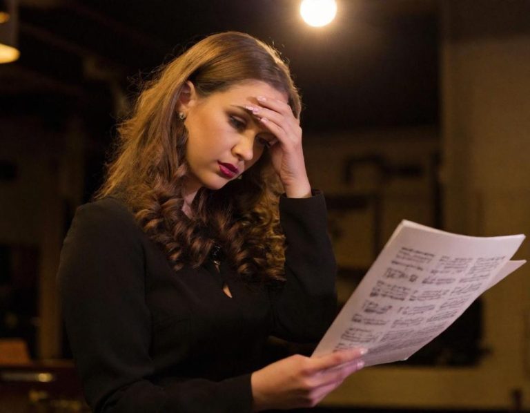 Presbyopia symptoms include experiencing eye strain or headaches after or during close work